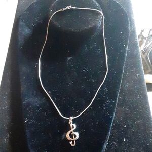 Elegant Silver tone Treble Clef Necklace